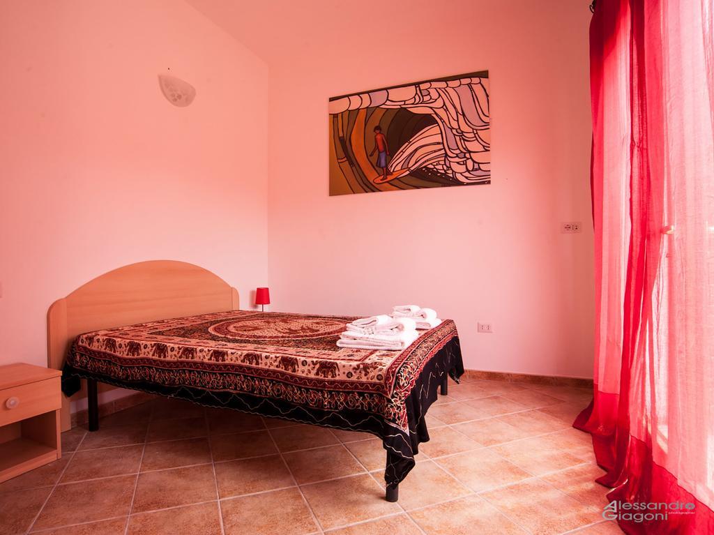 Aparthotel Residenze L'Isola Surf House Porto Pollo Zimmer foto