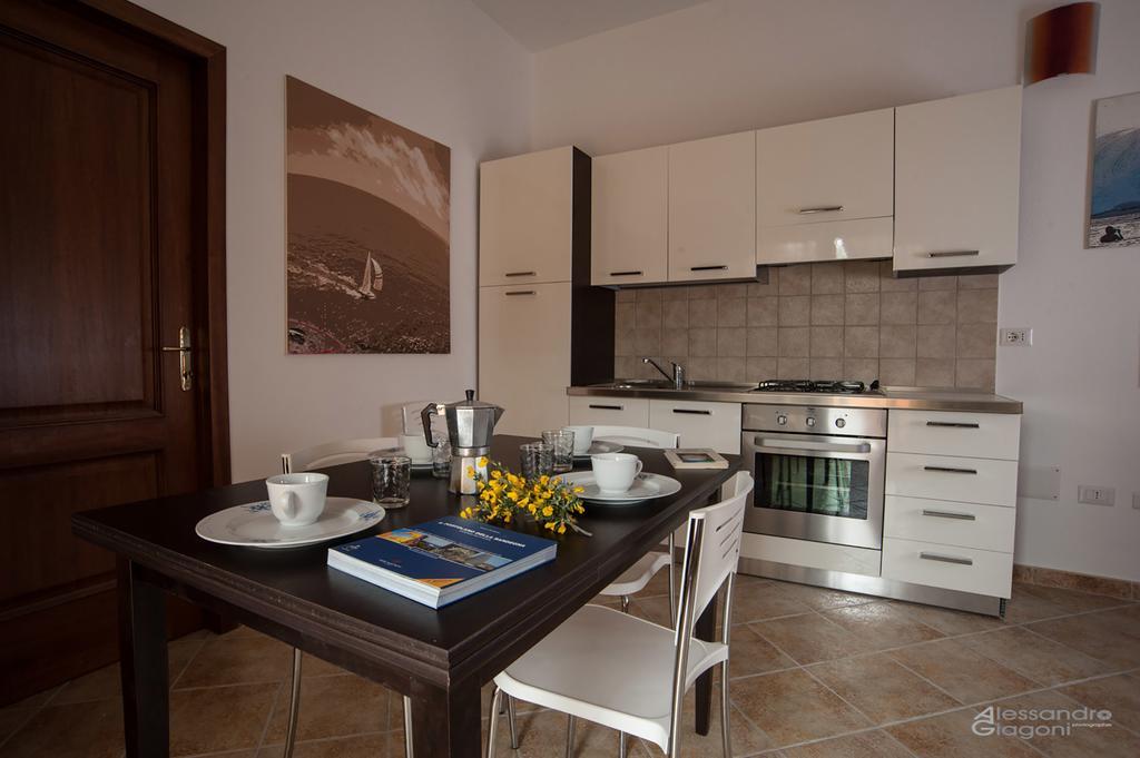 Aparthotel Residenze L'Isola Surf House Porto Pollo Zimmer foto