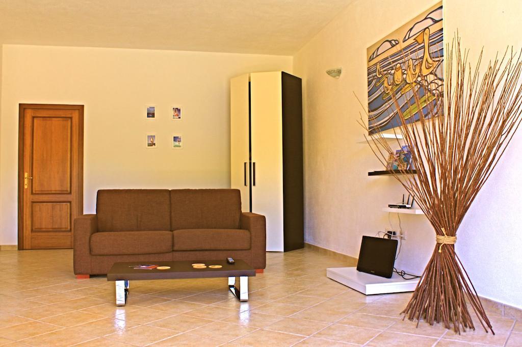 Aparthotel Residenze L'Isola Surf House Porto Pollo Zimmer foto